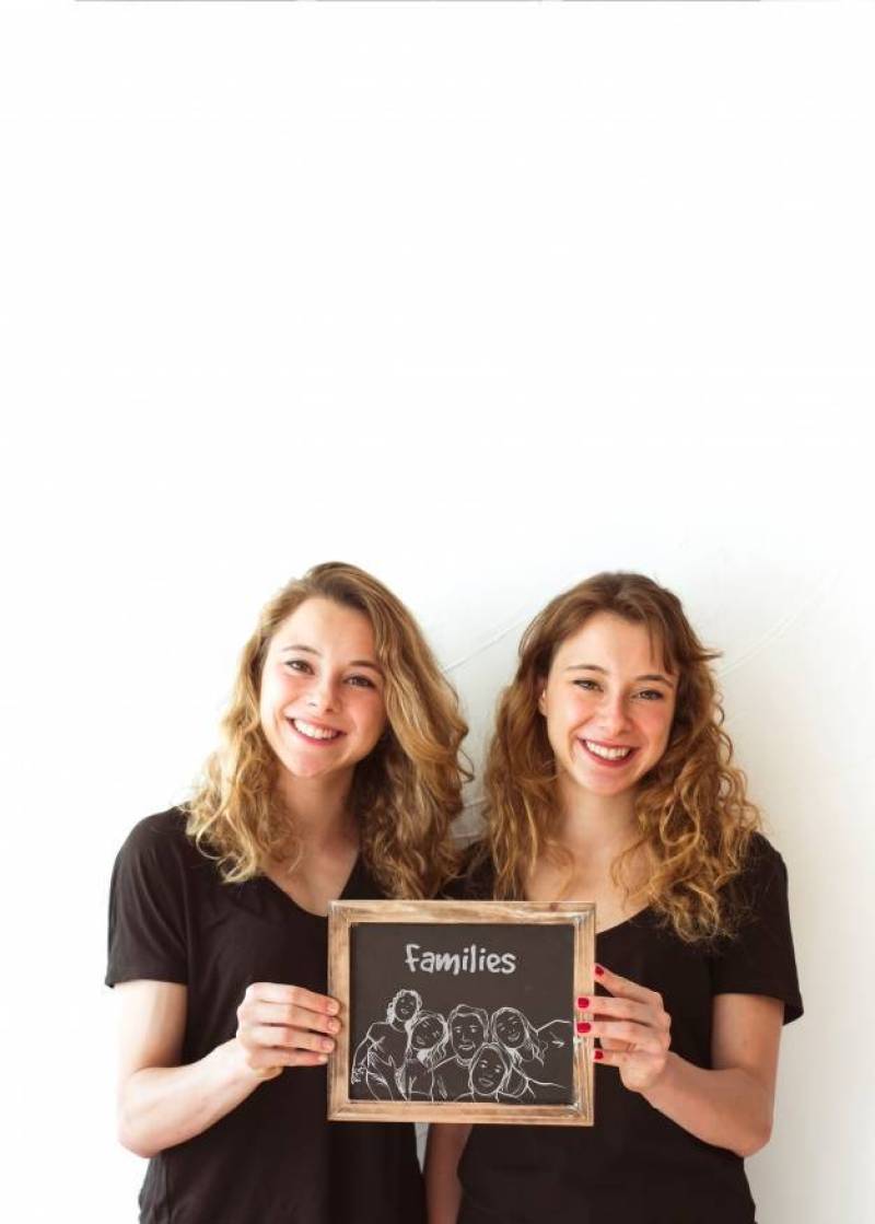 Young girls holding slate mockup