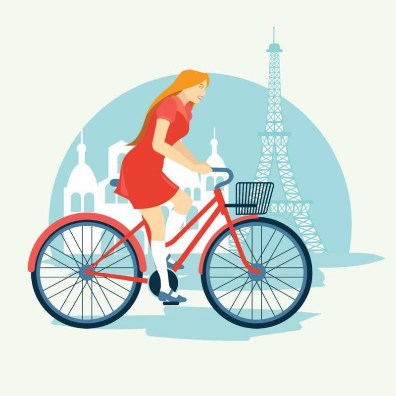 女子骑着自行车Bonjour巴黎