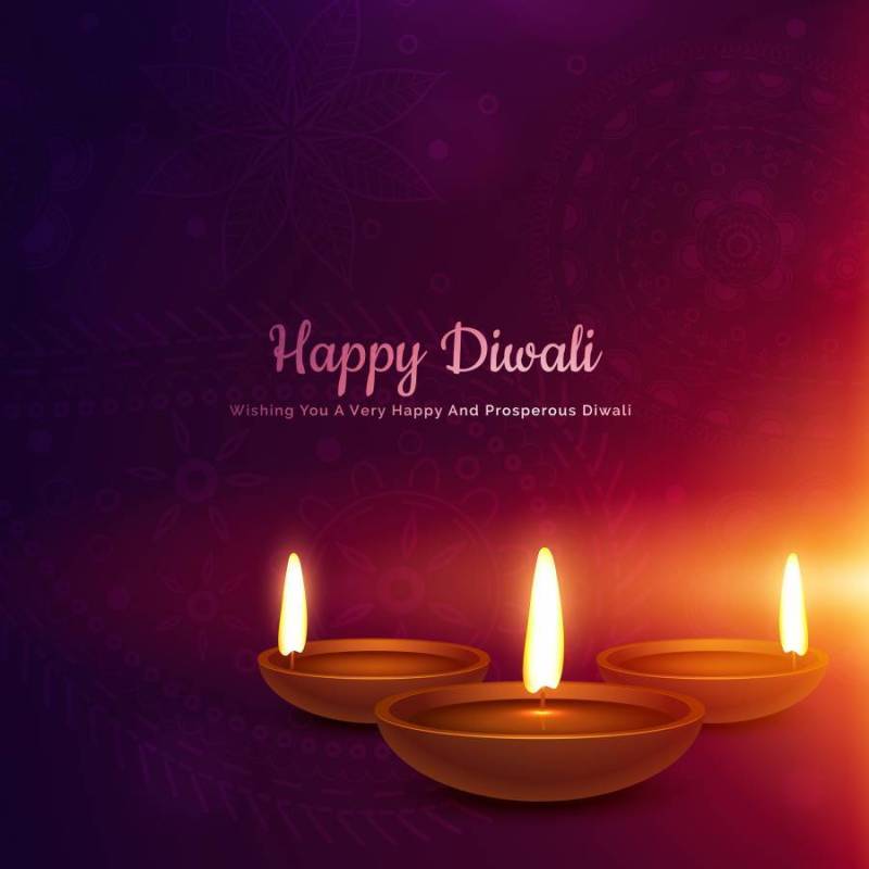 在发光的浅色背景中的diwali节日diya