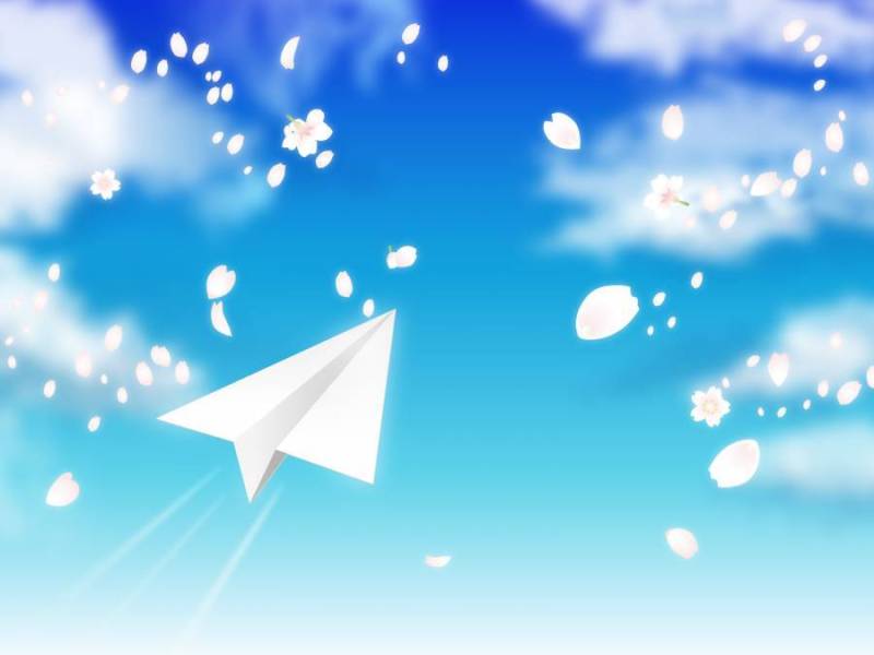 蓝蓝的天空和樱花与暴风雪和纸飞机