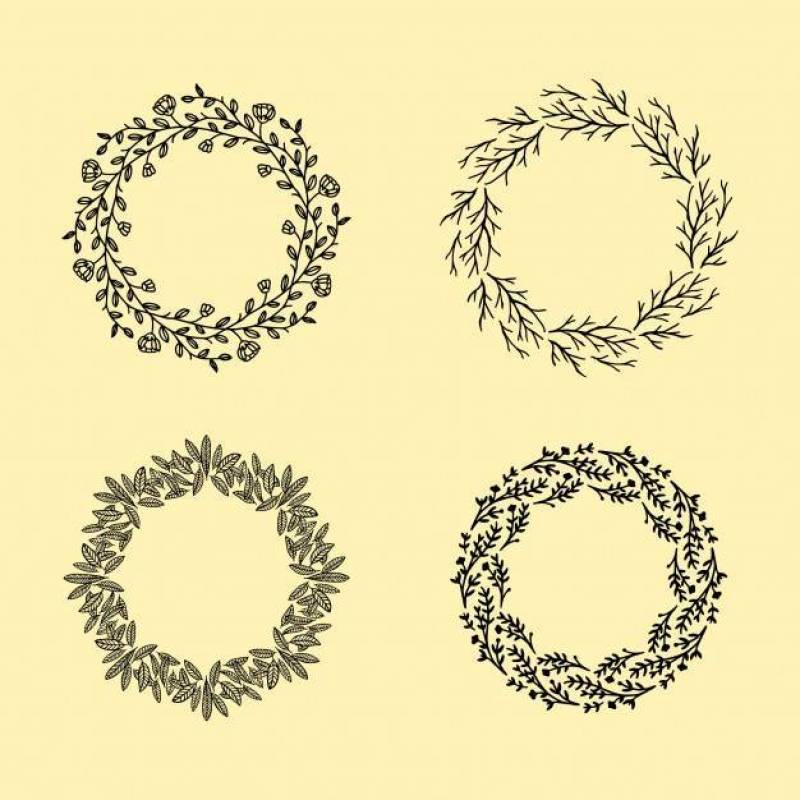 Set of hand drawn vector round floral wreaths. Floral circle frame design element