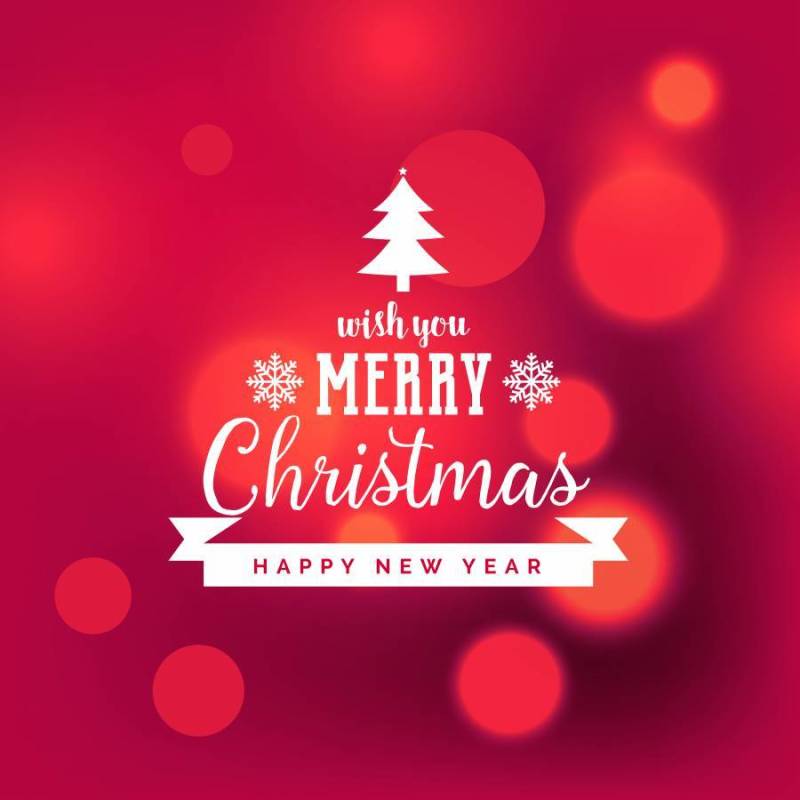 与bokeh作用的典雅的红色圣诞快乐圣诞节背景