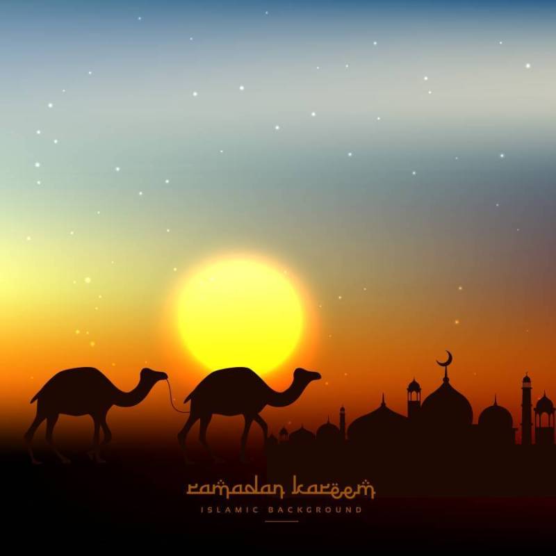 斋月贾巴尔背景在傍晚的天空与太阳