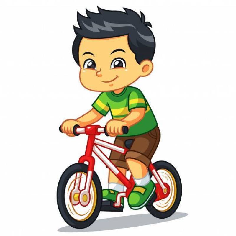 骑新的红色自行车的男孩。