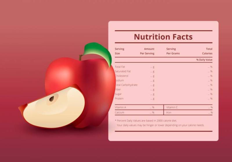 一个营养事实标签与苹果果实的插图