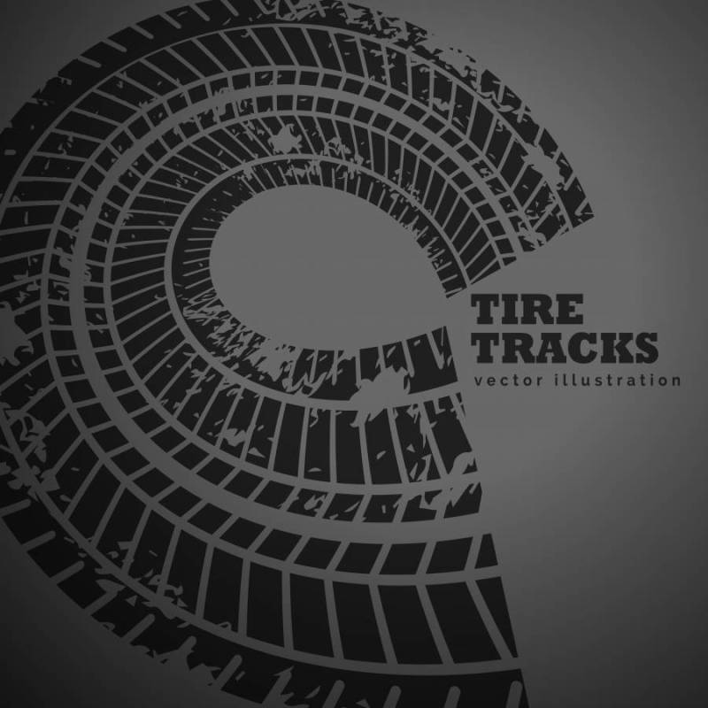 在黑暗的背景的圆形轮胎轨道