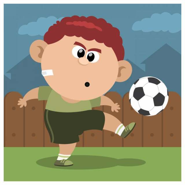一个踢足球的男孩