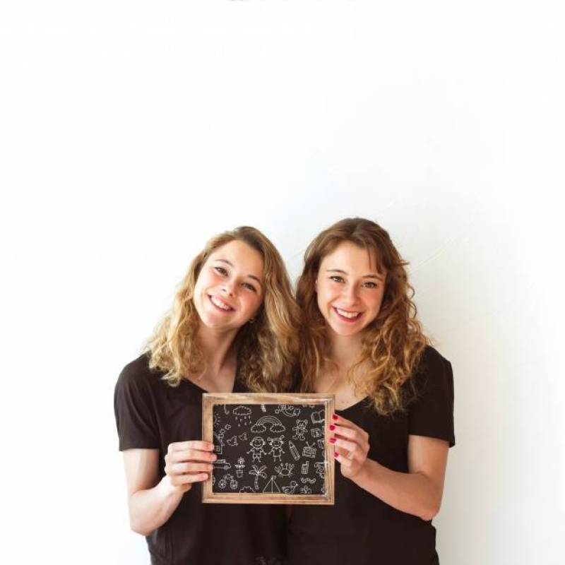 Young girls holding slate mockup
