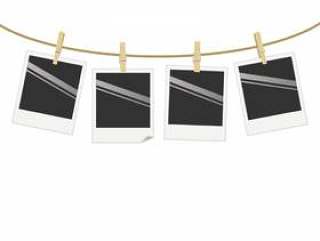 宝丽来的照片挂在琴弦上