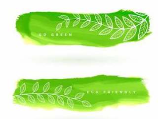 与叶子装饰的绿色水彩污点