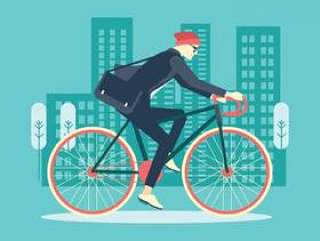 酷男商人骑自行车到办公室