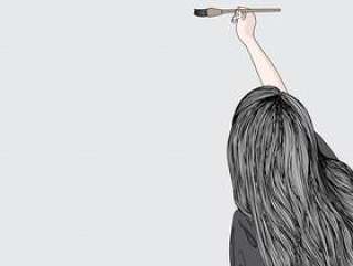 The girl is coloring in on a gray background badge